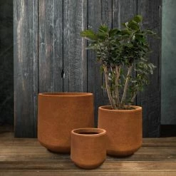 KANTE 17.3 in., 13.4 in., & 10.6 in. H Round Iron Oxide Concrete Planter (Set of 3) Outdoor Indoor Large Pots w/Drainage Holes -Vigoro Shop iron oxide kante plant pots rf2015022bcd c80621 fa 1000