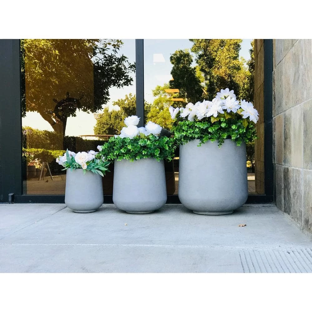 KANTE 17.3 in. Tall Natural Lightweight Concrete Footed Tulip Outdoor Round Planter (Set of 3) 6 KANTE 17.3 in. Tall Natural Lightweight Concrete Footed Tulip Outdoor Round Planter (Set of 3) - Image 4