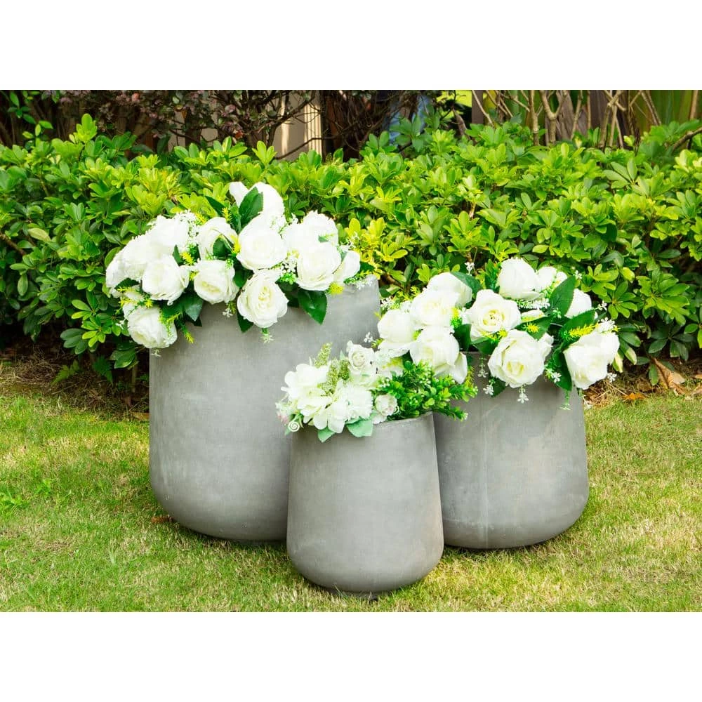 KANTE 17.3 in. Tall Natural Lightweight Concrete Footed Tulip Outdoor Round Planter (Set of 3) 4 KANTE 17.3 in. Tall Natural Lightweight Concrete Footed Tulip Outdoor Round Planter (Set of 3) - Image 2