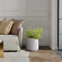 KANTE 13.4 in. H Pure White Tuliped Round Concrete Planter, Outdoor Indoor Large Planter Pots, Containers with Drainage Holes 10 KANTE 13.4 in. H Pure White Tuliped Round Concrete Planter, Outdoor Indoor Large Planter Pots, Containers with Drainage Holes -Vigoro Shop pure white kante plant pots rf2015022c c80011 1f 1000