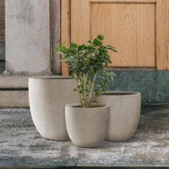 KANTE 22.4", 20.4" and 18.1"H Round Weathered Finish Concrete Planters Set of 3, Outdoor Indoor w/Drainage Hole & Rubber Plug -Vigoro Shop weathered concrete kante plant pots rc0153bcd c80021 2 66 1000