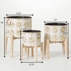SULLIVANS White and Gold Flower Burst Metal Planter on Stand (Set of 3) -Vigoro Shop white and gold patterned sullivans plant pots met1880 1f 1000